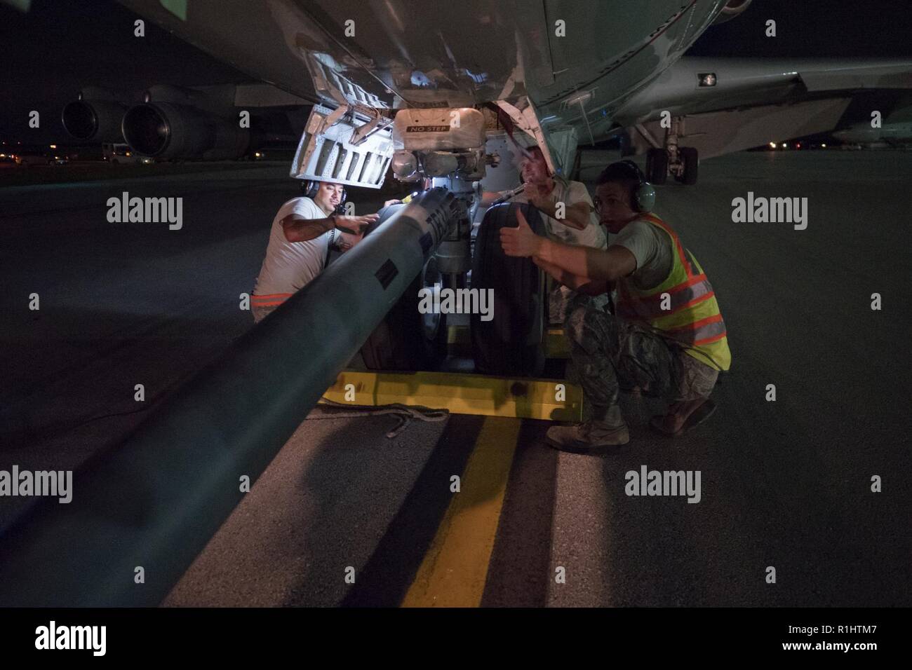 U S Air Force Aircraft Maintenance Personnel From Team Jstars Robins Air Force Base Georgia Install A Tow Bar On An E 8c Joint Stars Returning From A Night Mission In Support Of Valiant