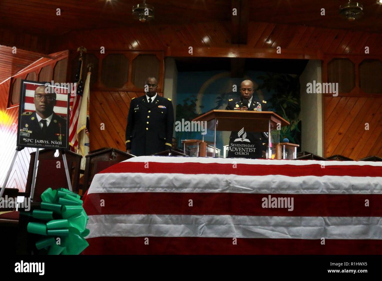 Col. Kodjo KnoxLimbacker calls attention to orders during a posthumous promotion ceremony held