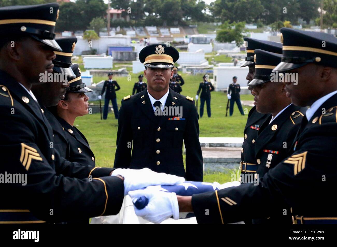 Members of the Virgin Islands Army National Guard Funeral Honors Team fold a U.S. Flag in honor