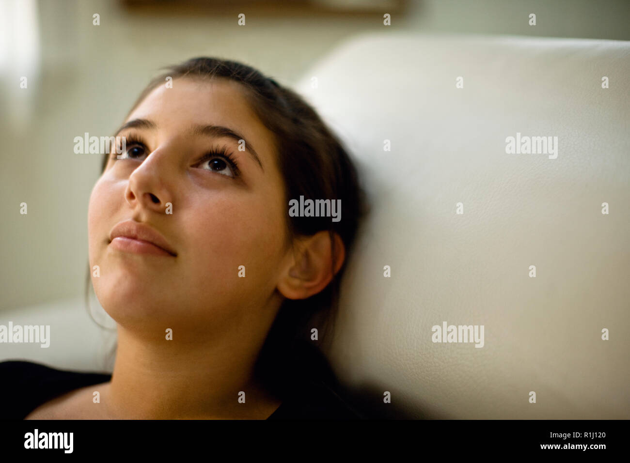 Preteen girl lying on back hi-res stock photography and images - Alamy