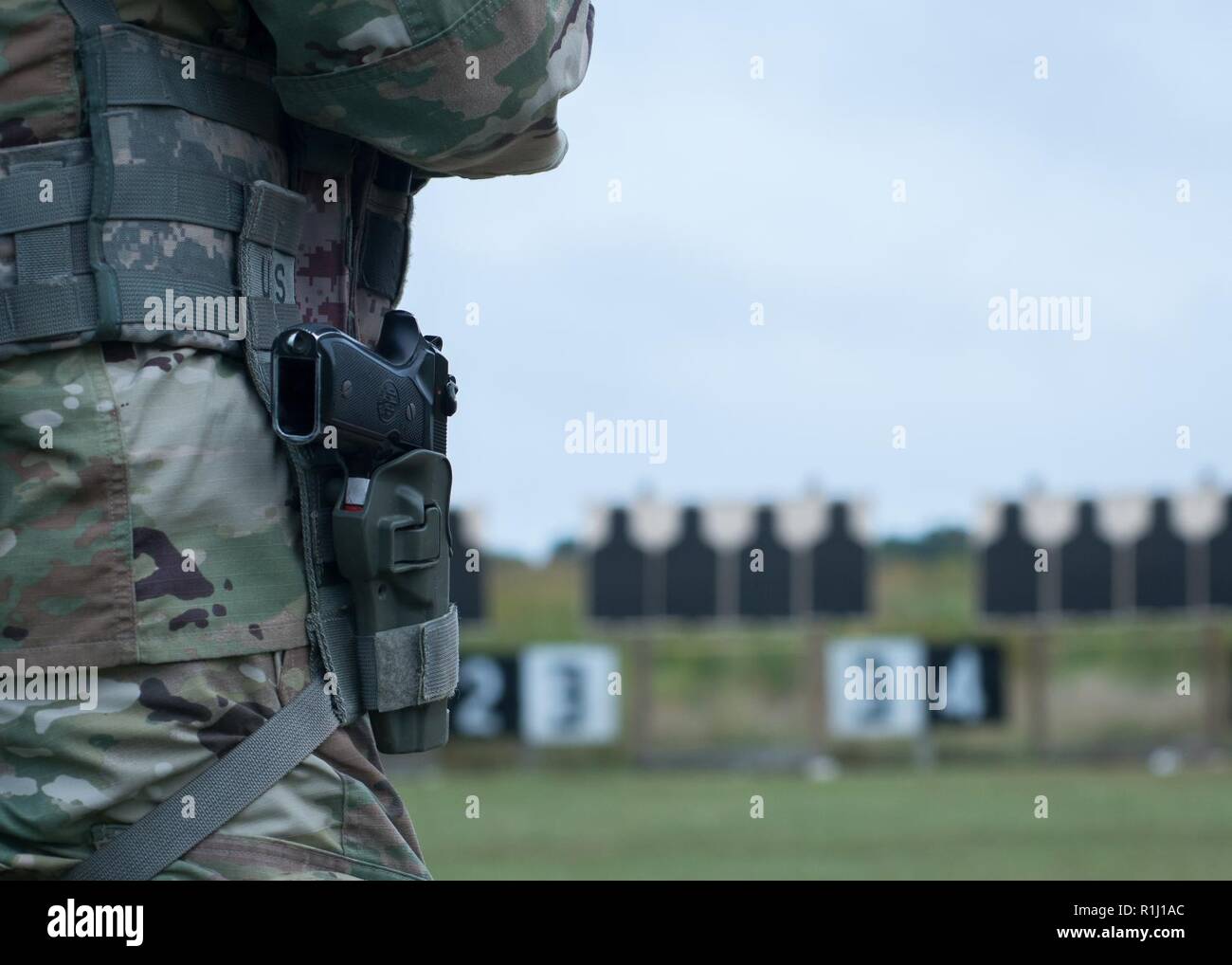 A Governor's Twenty competitor eyes multiple M9 9 mm Excellencein