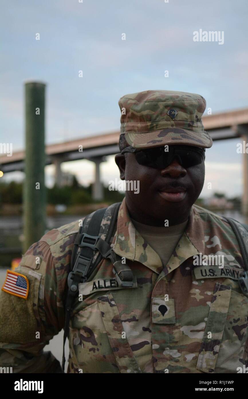 Specialist Marcus Allen, 125th Multi-Role Bridge Company crew member, poses for a portrait following a training exercise on the Sampit River in Georgetown, South Carolina on Sept. 24, 2018. The South Carolina National Guard currently has more than 2,000 troops on the ground preparing for the flooding aftermath of Hurricane Florence. Stock Photo