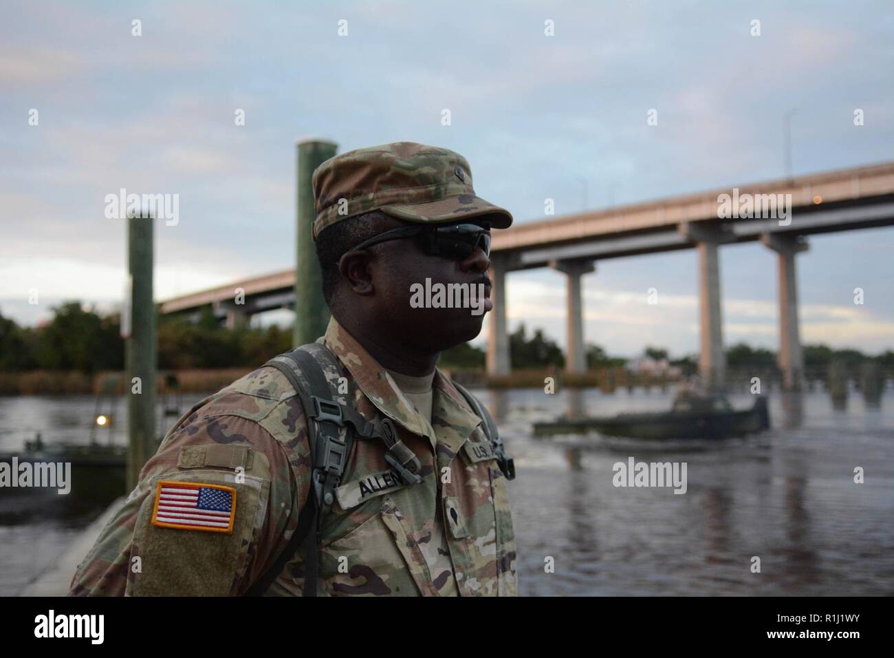 Specialist Marcus Allen, 125th Multi-Role Bridge Company crew member, poses for a portrait following a training exercise on the Sampit River in Georgetown, South Carolina on Sept. 24, 2018. The South Carolina National Guard currently has more than 2,000 troops on the ground preparing for the flooding aftermath of Hurricane Florence. Stock Photo