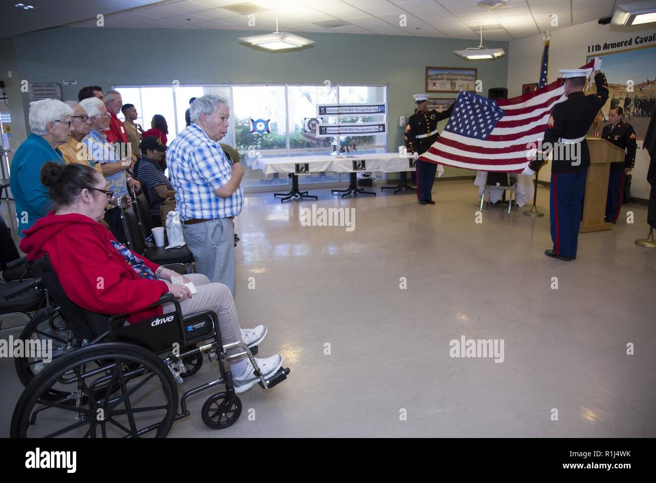 Residents of Veterans Home of CaliforniaBarstow, stand for the Pledge