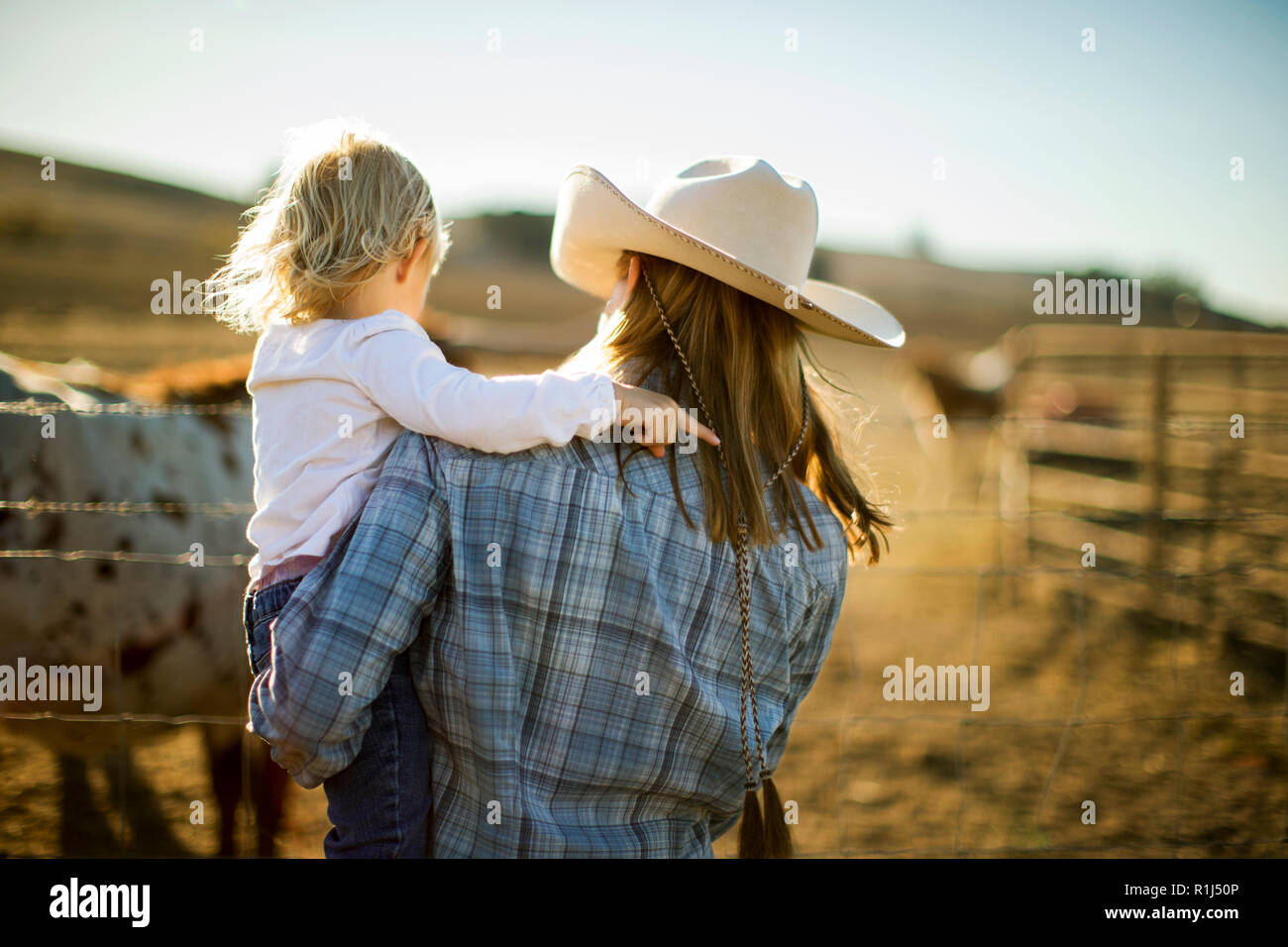 Farmer's toddler out and about on the ranch. Stock Photo