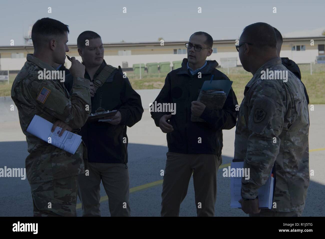 Defense Threat Reduction Agency inspection team and a Conventional Forces  in Europe inspection escort team, conduct a meeting about the guidelines of  the CFE treaty exercise, at Spangdahlem Air Base, Germany, Oct.