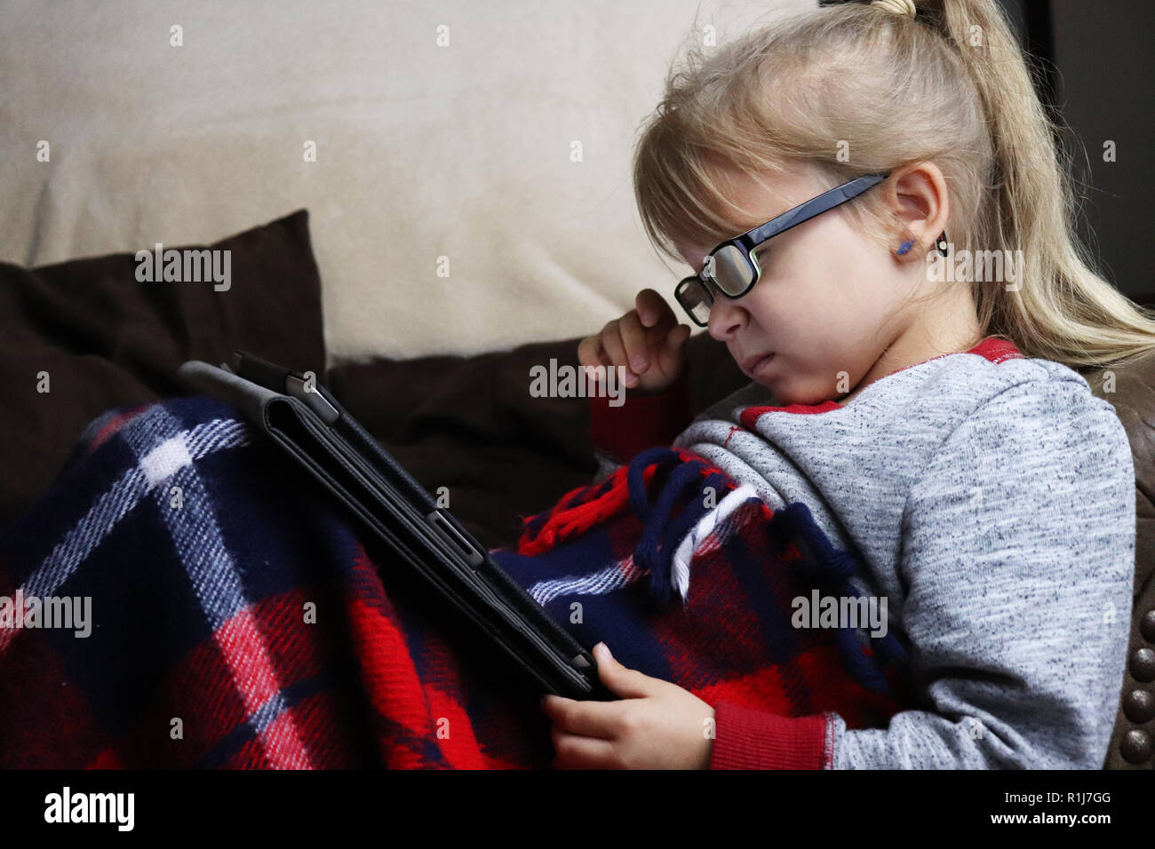 Toddler playing on a tablet Stock Photo Alamy