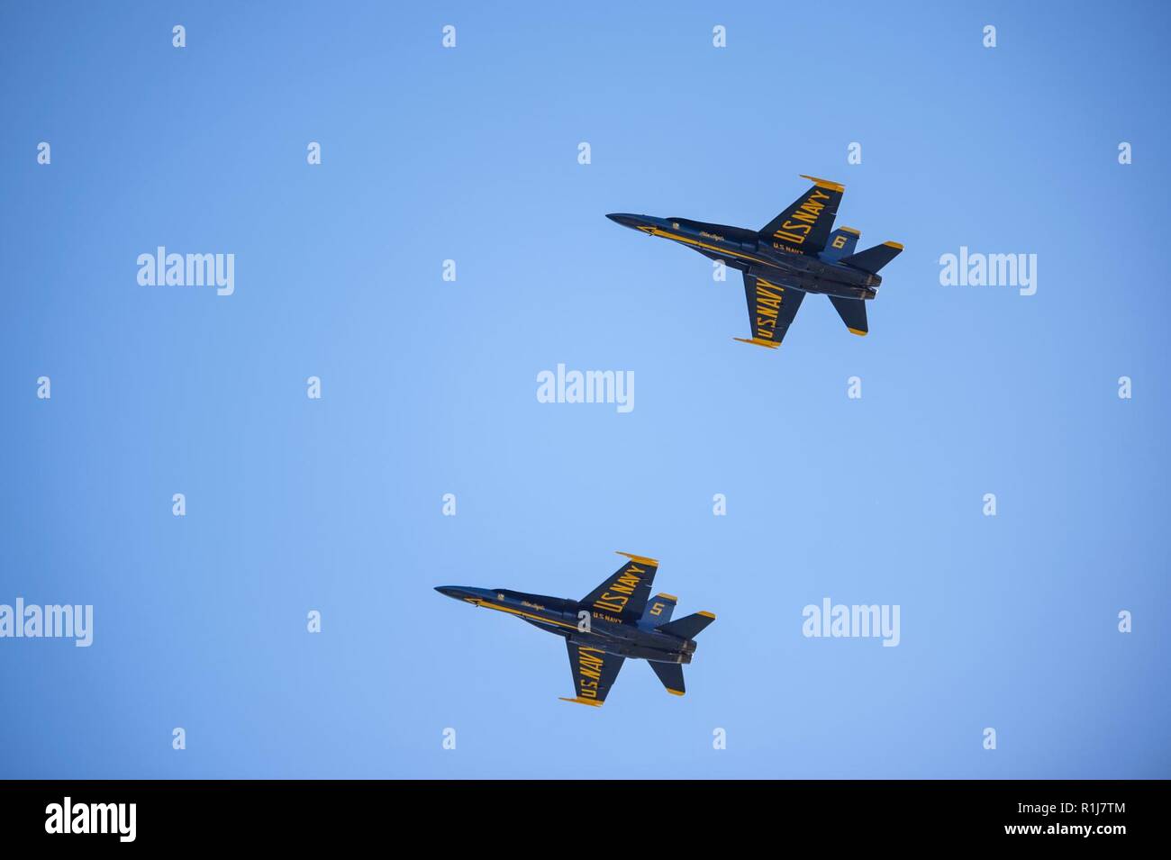 SAN FRANCISCO (Oct. 6, 2018) The U.S. Navy demonstration squadron, the Blue Angels, fly over the amphibious assault ship USS Bonhomme Richard (LHD 6) during San Francisco Fleet Week 2018. San Francisco Fleet Week is an opportunity for the American public to meet their Navy, Marine Corps and Coast Guard teams and experience America’s sea services. During Fleet Week, service members participate in various community service events, showcase capabilities and equipment to the community, and enjoy the hospitality of San Francisco and its surrounding areas. Stock Photo