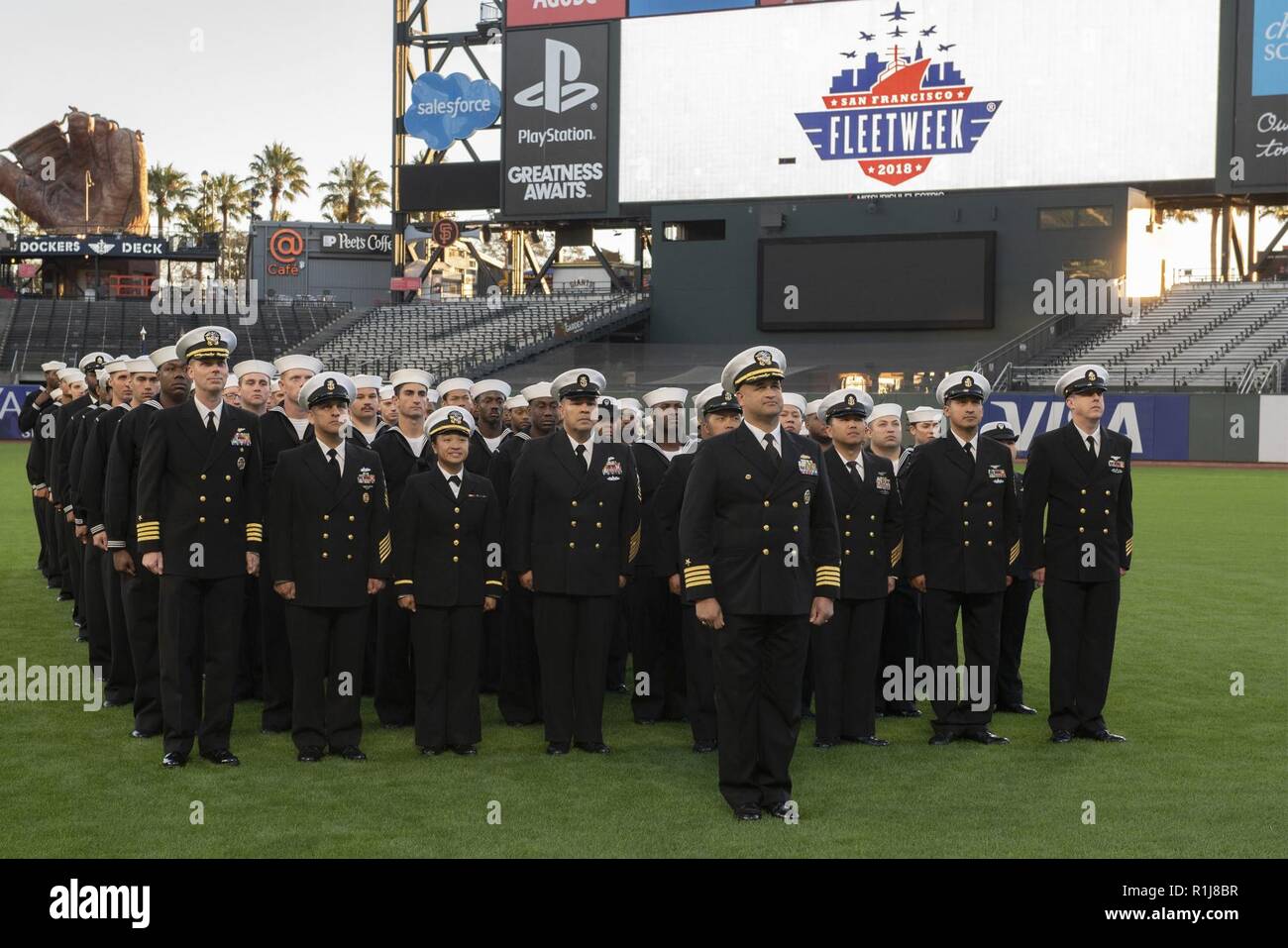 SAN FRANCISCO (Oct. 7, 2018) Sailors, assigned to the amphibious assault ship USS Bonhomme Richard (LHD 6), pose for a group photo at the AT&T Park stadium during San Francisco Fleet Week 2018. San Francisco Fleet Week is an opportunity for the American public to meet their Navy, Marine Corps and Coast Guard teams and experience America’s sea services. During fleet week, service members participate in various community service events, showcase capabilities and equipment to the community, and enjoy the hospitality of San Francisco and its surrounding areas. Stock Photo