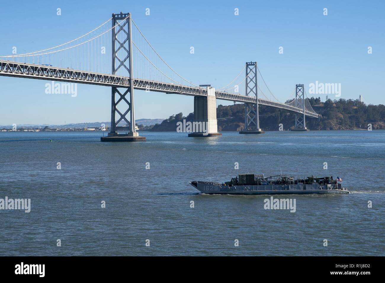 SAN FRANCISCO (Oct. 8, 2018) Landing Craft Utility (LCU) 1629, assigned to Beachmaster Unit (BMU) 1, navigates through the San Francisco Bay during San Francisco Fleet Week 2018. San Francisco Fleet Week is an opportunity for the American public to meet their Navy, Marine Corps and Coast Guard teams and experience America’s sea services. During fleet week, service members participate in various community service events, showcase capabilities and equipment to the community, and enjoy the hospitality of San Francisco and its surrounding areas. Stock Photo