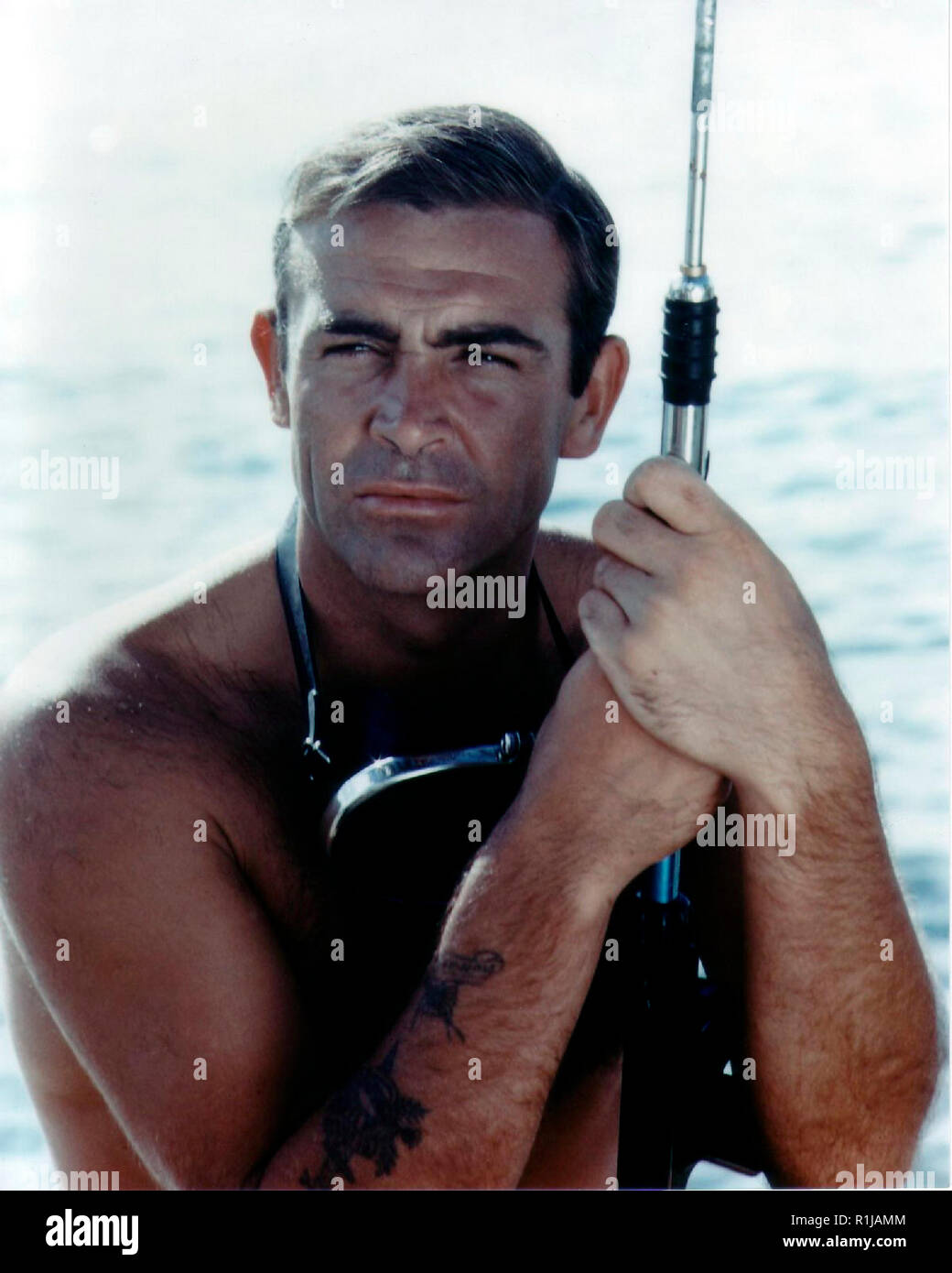 Thunderball is a 1965 British spy film and the fourth in the James Bond series produced by Eon Productions, starring Sean Connery as the fictional MI6 agent James Bond. It is an adaptation of the novel of the same name by Ian Fleming, which in turn was based on an original screenplay by Jack Whittingham. It was directed by Terence Young, with its screenplay by Richard Maibaum and John Hopkins. The movie would have been the first of the Bond series if not for legal disputes over copyright issues. Credit: Hollywood Photo Archive / MediaPunch Stock Photo