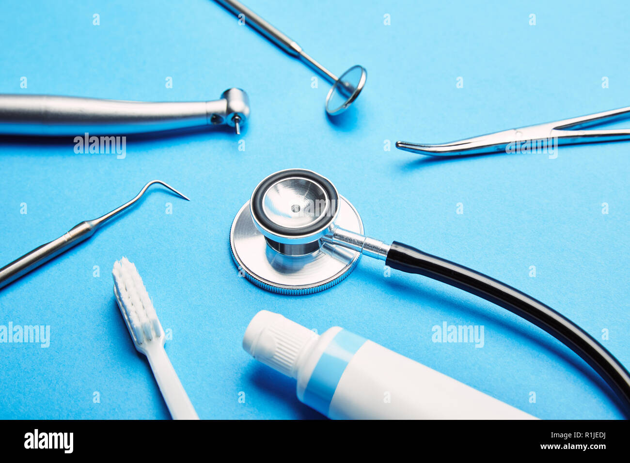 close up view of arrangement of sterile dental instruments, stethoscope