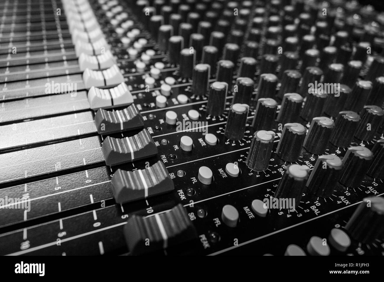 Low level view of Faders on a Professional Audio Sound Mixing Console ...