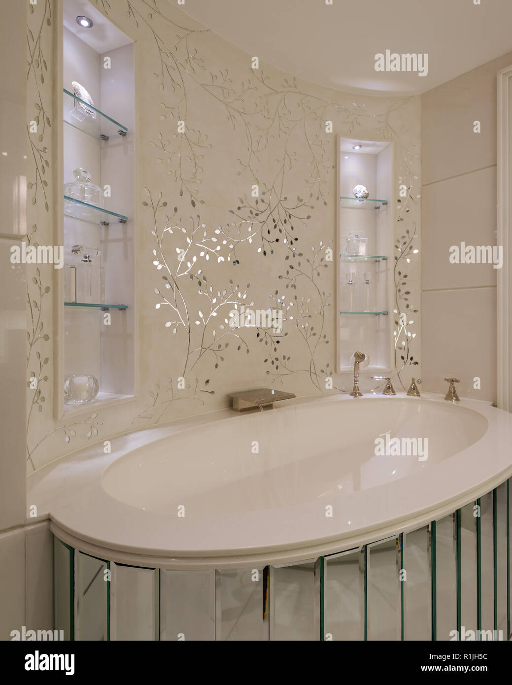 White floral wallpaper over bathtub Stock Photo Alamy