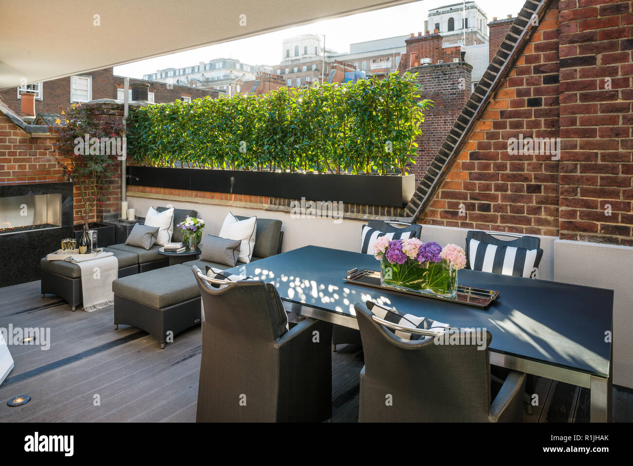 Modern deck with grey furniture Stock Photo Alamy