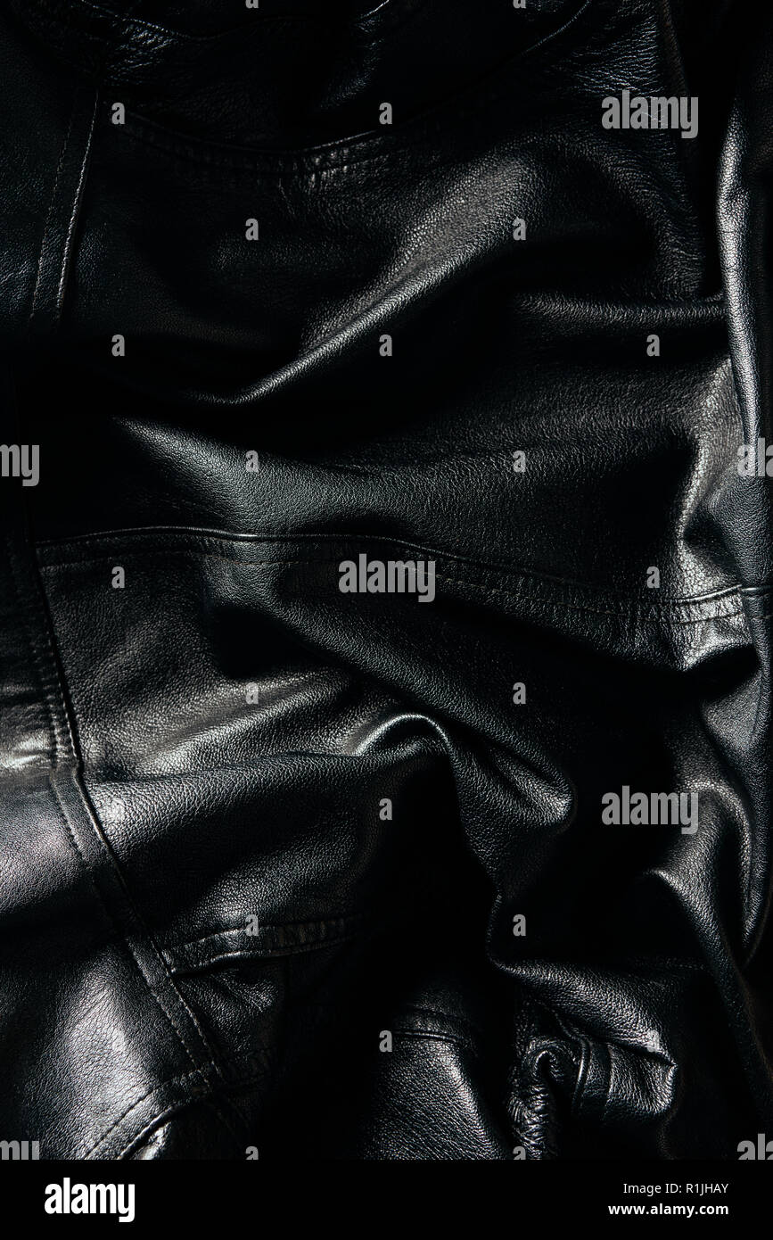 full frame of black leather jacket as background Stock Photo