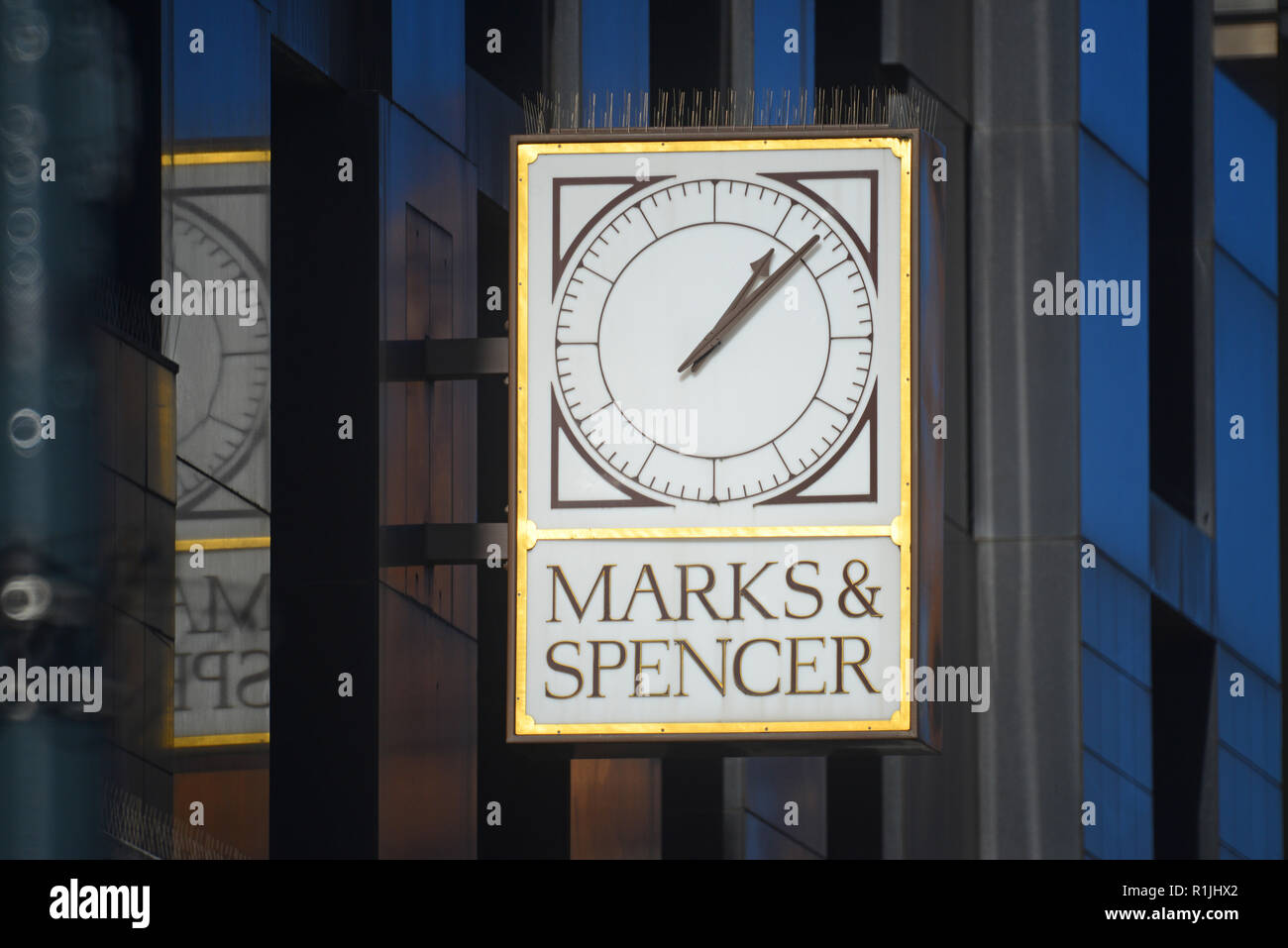 marks and spencer clock and sign above shop on briggate leeds united