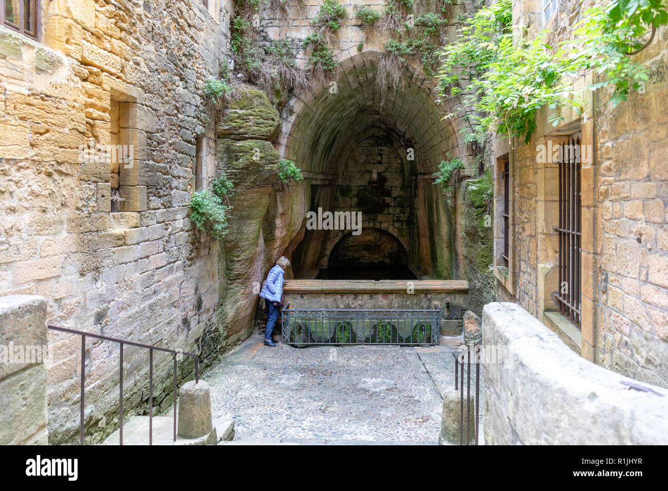 Ancient well at Sarlat-la-Caneda, Nouvelle- Aquitaine, France Stock Photo