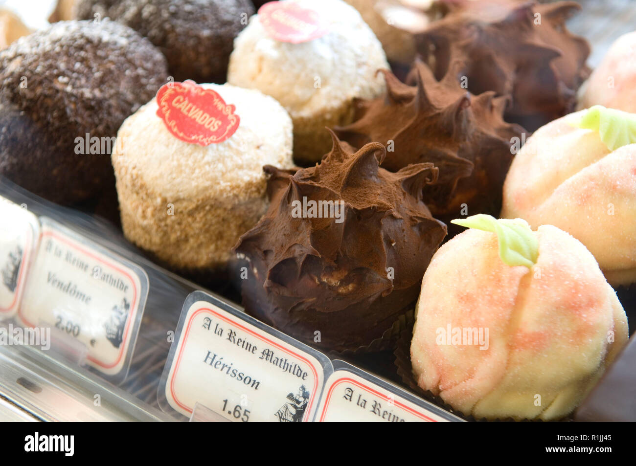 Desserts displayed in bakery Stock Photo