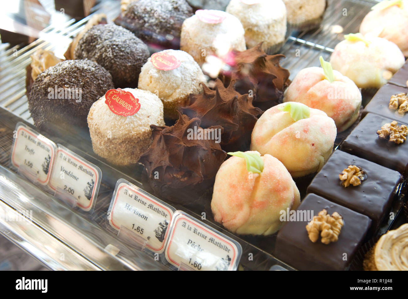 Desserts displayed in bakery Stock Photo
