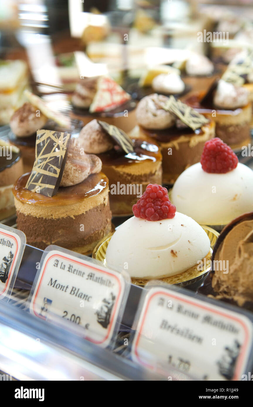 Desserts displayed in bakery Stock Photo