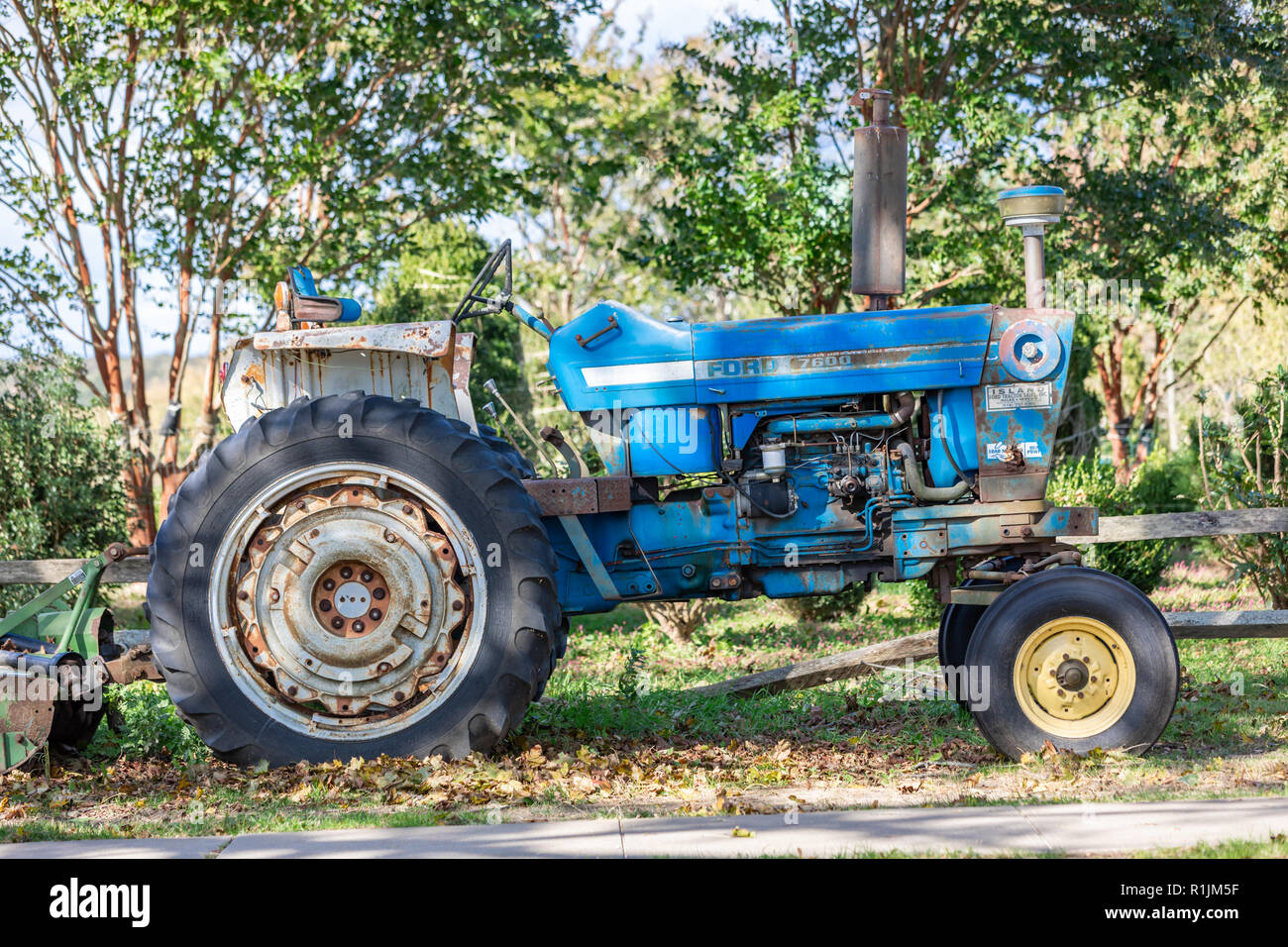 A well used blue Ford farm tractor in Wainscott, NY Stock Photo