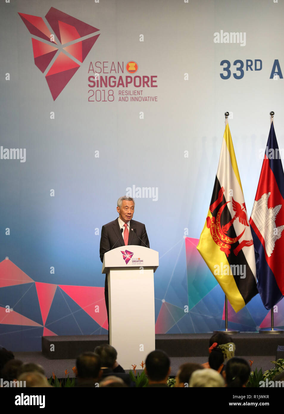 Singapore. 13th Nov, 2018. Singaporean Prime Minister Lee Hsien Loong addresses the opening ceremony of the 33rd summit of the Association of Southeast Asian Nations (ASEAN) in Singapore, on Nov. 13, 2018. The 33rd ASEAN summit opened here Tuesday with a call for upholding multilateralism and international cooperation. Credit: Li Gang/Xinhua/Alamy Live News Stock Photo