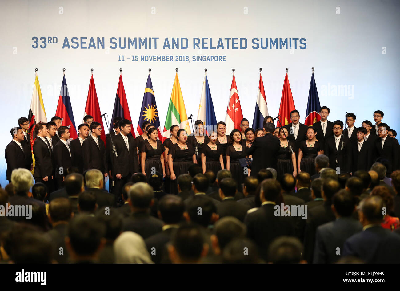 Singapore. 13th Nov, 2018. A chorus performs during the opening ceremony of the 33rd summit of the Association of Southeast Asian Nations (ASEAN) in Singapore, on Nov. 13, 2018. The 33rd ASEAN summit opened here Tuesday with a call for upholding multilateralism and international cooperation. Credit: Li Gang/Xinhua/Alamy Live News Stock Photo