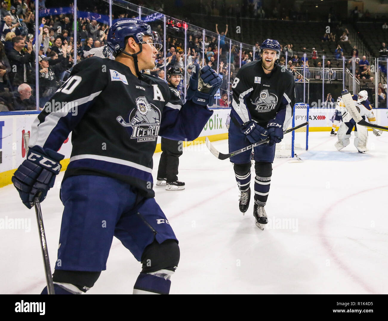 Nov 12 - Jacksonville, FL, U.S.: Jacksonville Icemen forward Wacey Rabbit (20), left, celebrates his score with forward Cam Maclise (8) during the first period of an ECHL professional hockey at the Veterans Memorial Arena in Jacksonville, Fla., Monday, Nov. 12, 2018. Icemen won in a shoot-out 3-2. (Gary Lloyd McCullough/ Cal Sport Media) Stock Photo