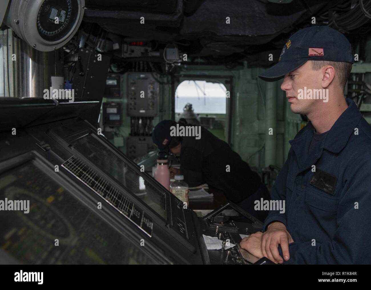ATLANTIC OCEAN (Oct. 10, 2018) Seaman Devin Gauthe stands the lee helm watch on the bridge