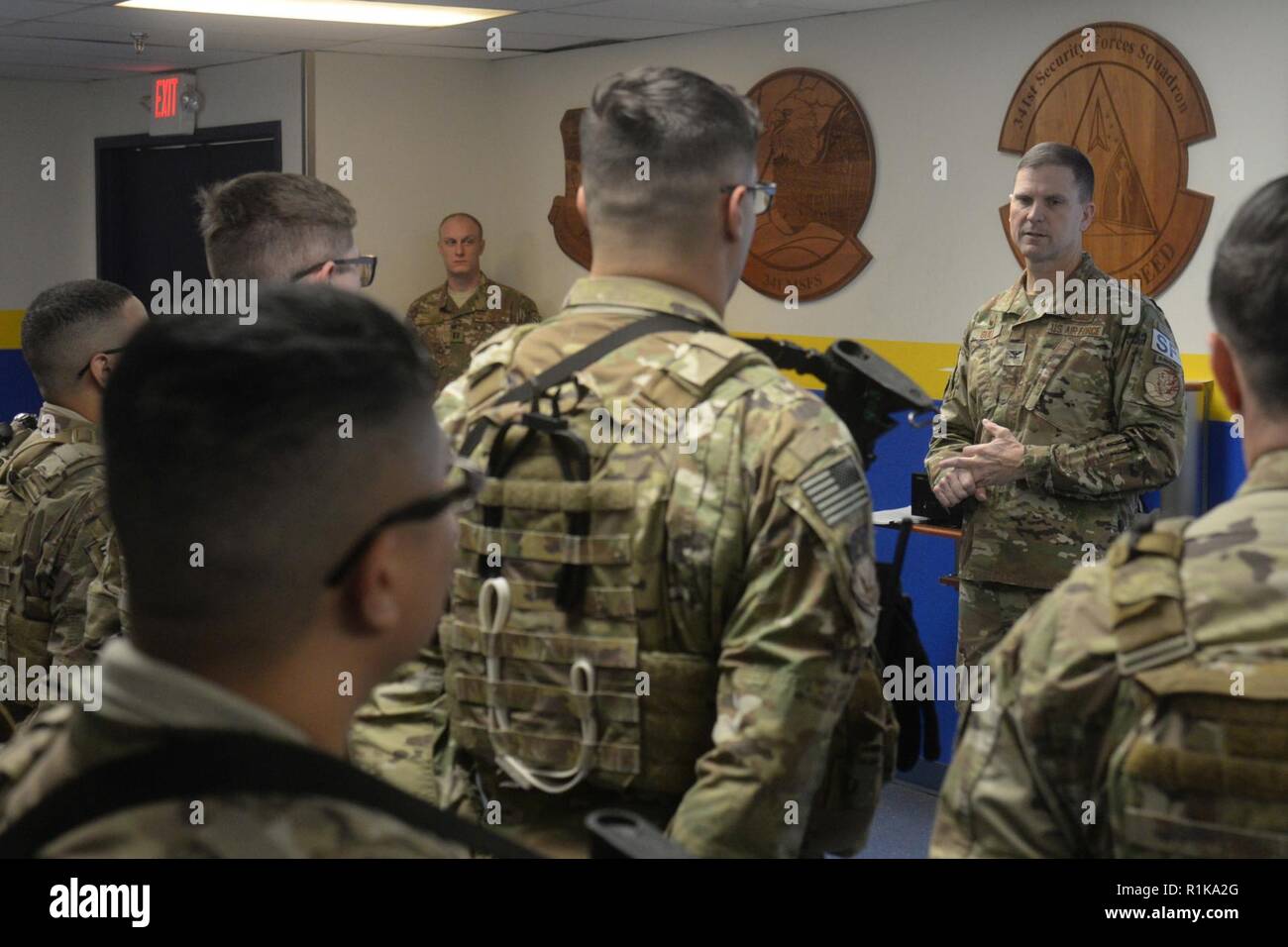 Col. Aaron Guill, 341st Security Forces Group commander, briefs defenders during guardmount Oct. 5, 2018, at Malmstrom Air Force Base, Mont. Guill visited Airmen to answer questions and commemorate the anniversary of the Missile Security Operations Concept. Stock Photo