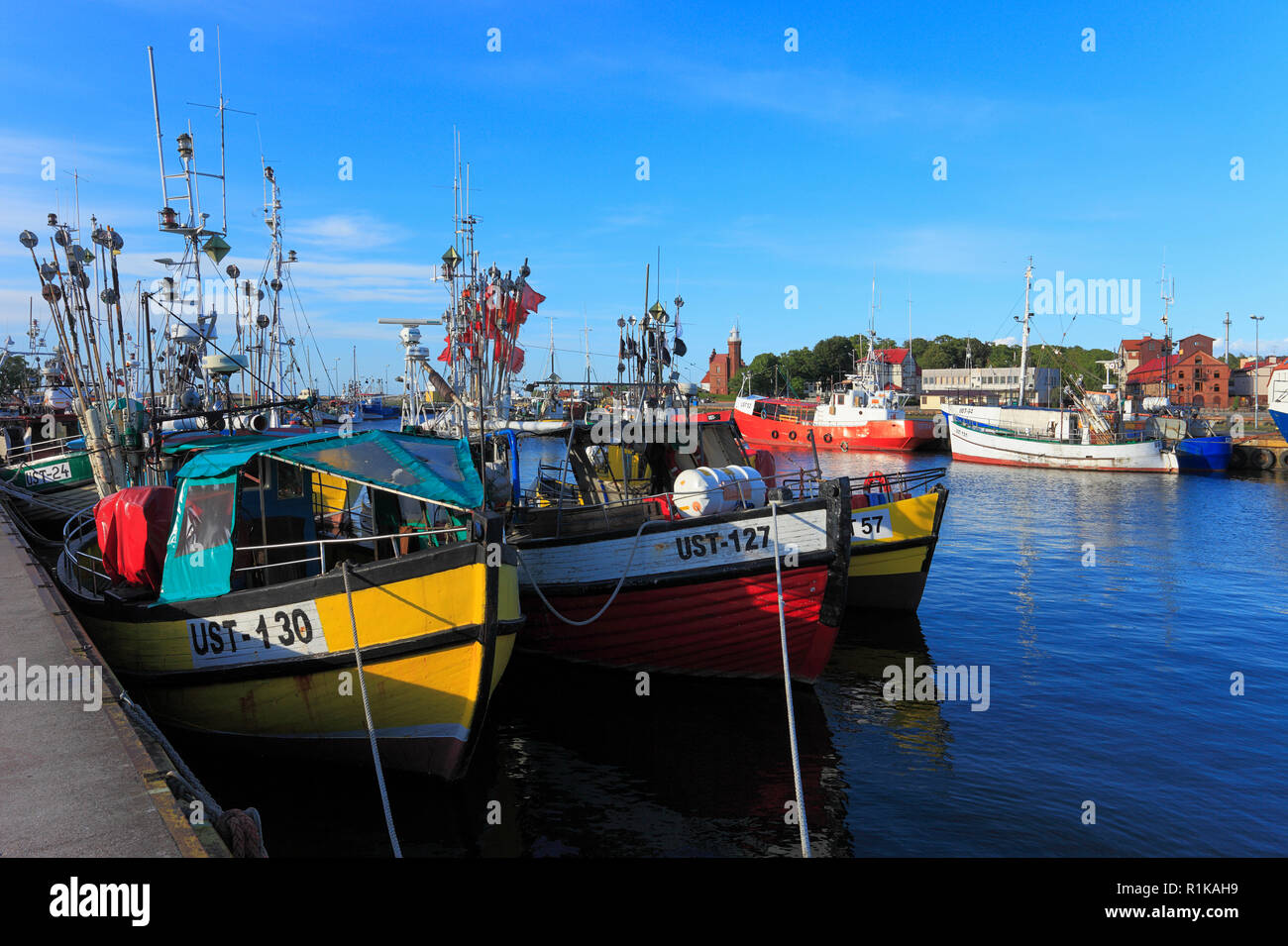 Ustka, Pomerania / Poland - 2009/07/02: Ustka fishing port with cutters and peers at the Baltic Sea shoreline Stock Photo