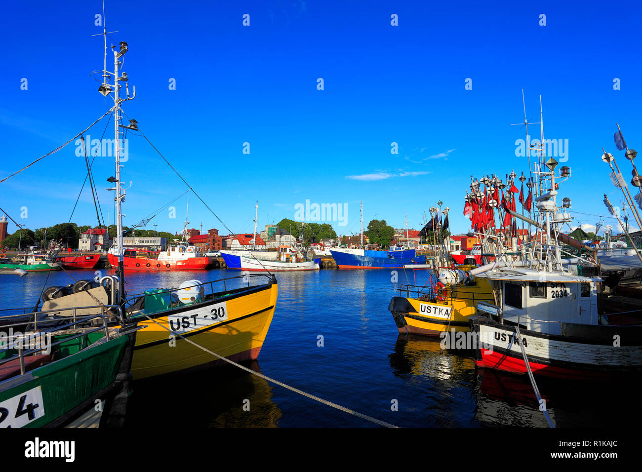 Ustka, Pomerania / Poland - 2009/07/02: Ustka fishing port with cutters and peers at the Baltic Sea shoreline Stock Photo