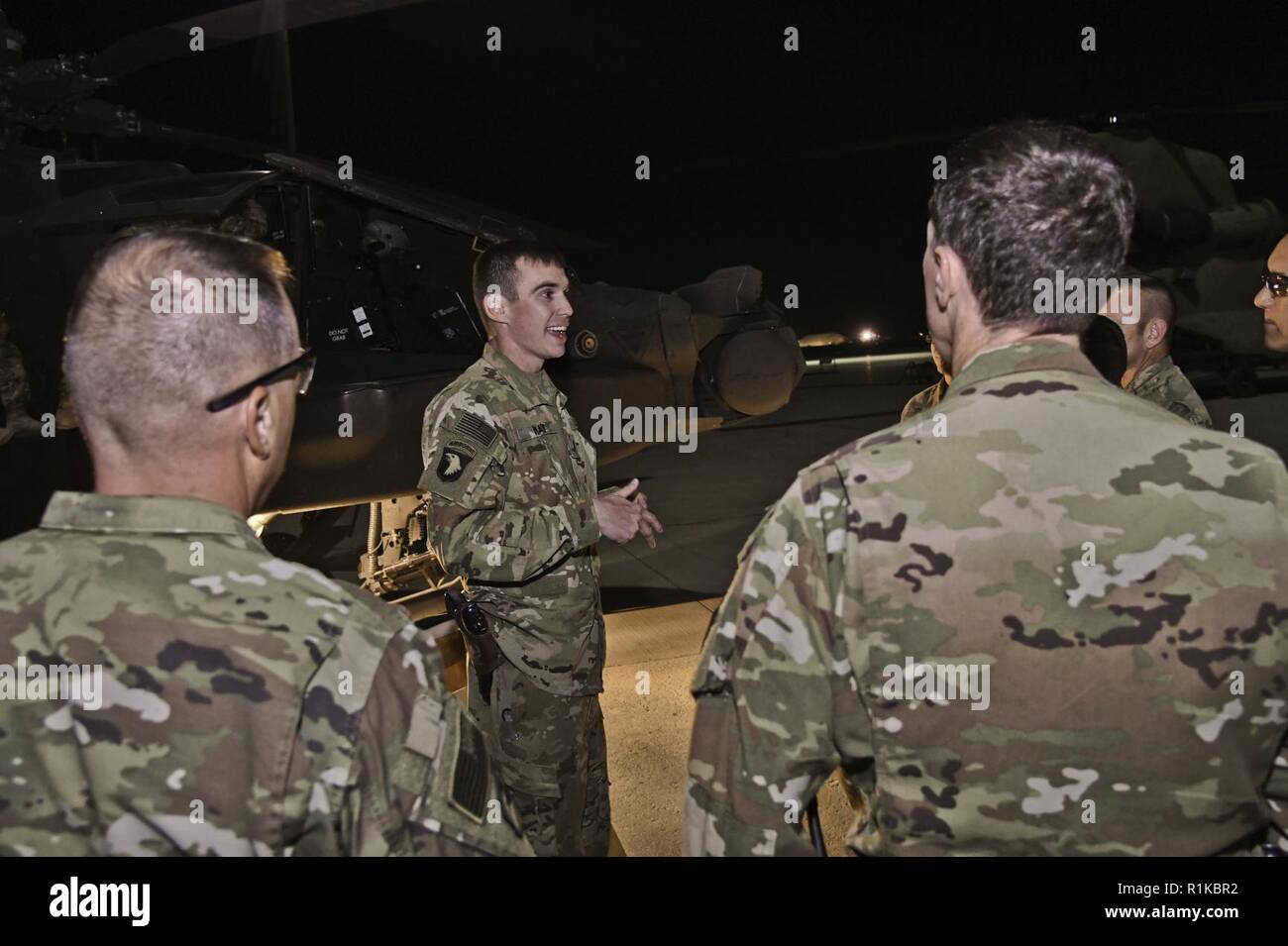 U.S. Army Soldiers assigned to Task Force Shadow conduct an Aviation Capabilities round robin at Bagram Airfield, Afghanistan Oct 6. The event was part of an officer professional development program for senior leaders of United States Forces-Afghanistan. TF Shadow provided detailed and informative aircraft maintenance capabilities briefs along with hands on demonstrations of the AH-64 Apache Helicopter, UH-60 Blackhawk Helicopter, CH-47 Chinook Helicopter and several helicopter display monitors. Stock Photo