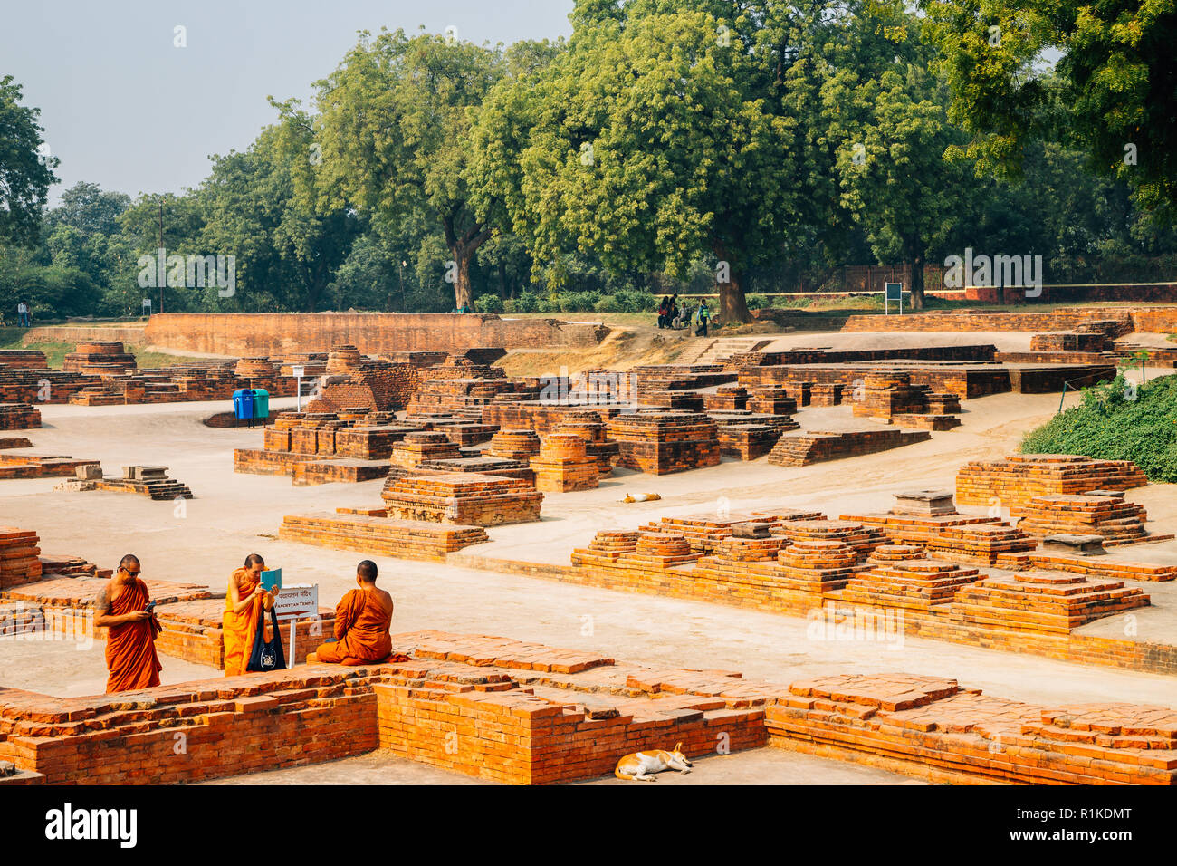 Varanasi, India - November 23, 2017 : Sarnath ancient ruins and monks Stock Photo