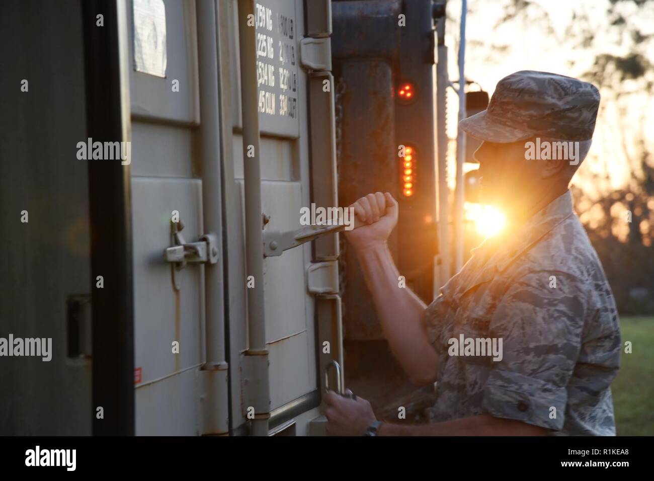 U.S. Air Force Maj. Bjorn Hegleson, 165th Airlift Wing, opens a conex box to conduct Hurricane Michael relief operations in Seminole County, Ga., Oct. 14, 2018. The Georgia Air National Guard is working with local authorities to conduct route clearance and debris removal. Stock Photo