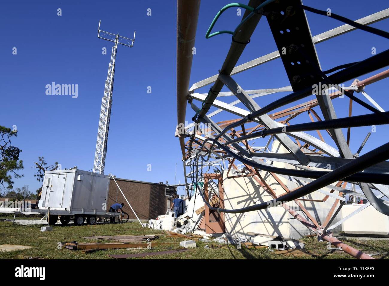 Kyle Rosen, Motorola Solutions tower hand, prepares to restore ...