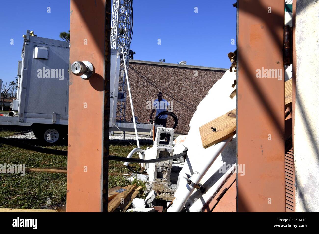 Kyle Rosen, Motorola Solutions tower hand, prepares to restore ...