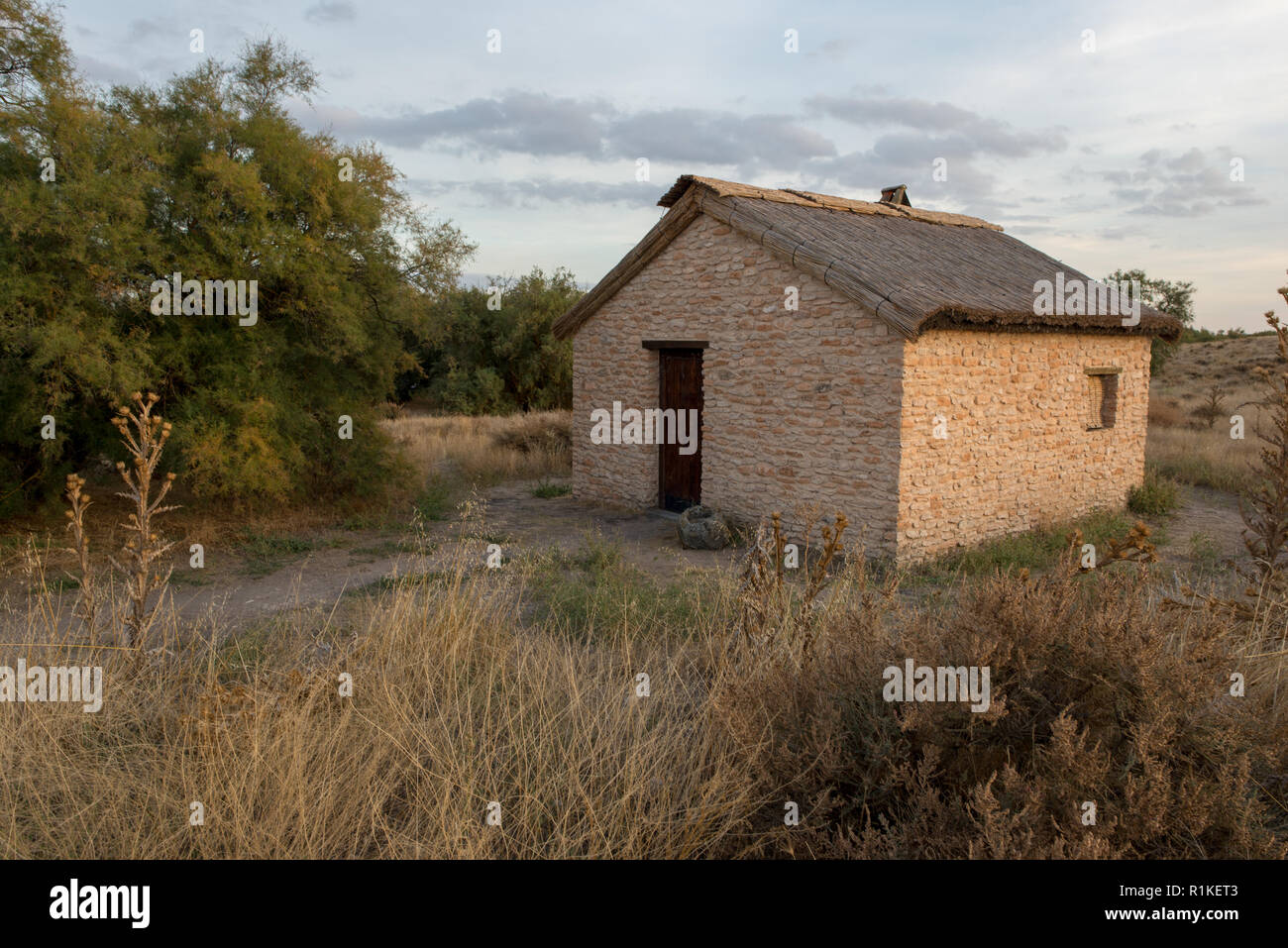 Lonely stone house on the tables of daimiel, Spain Stock Photo - Alamy