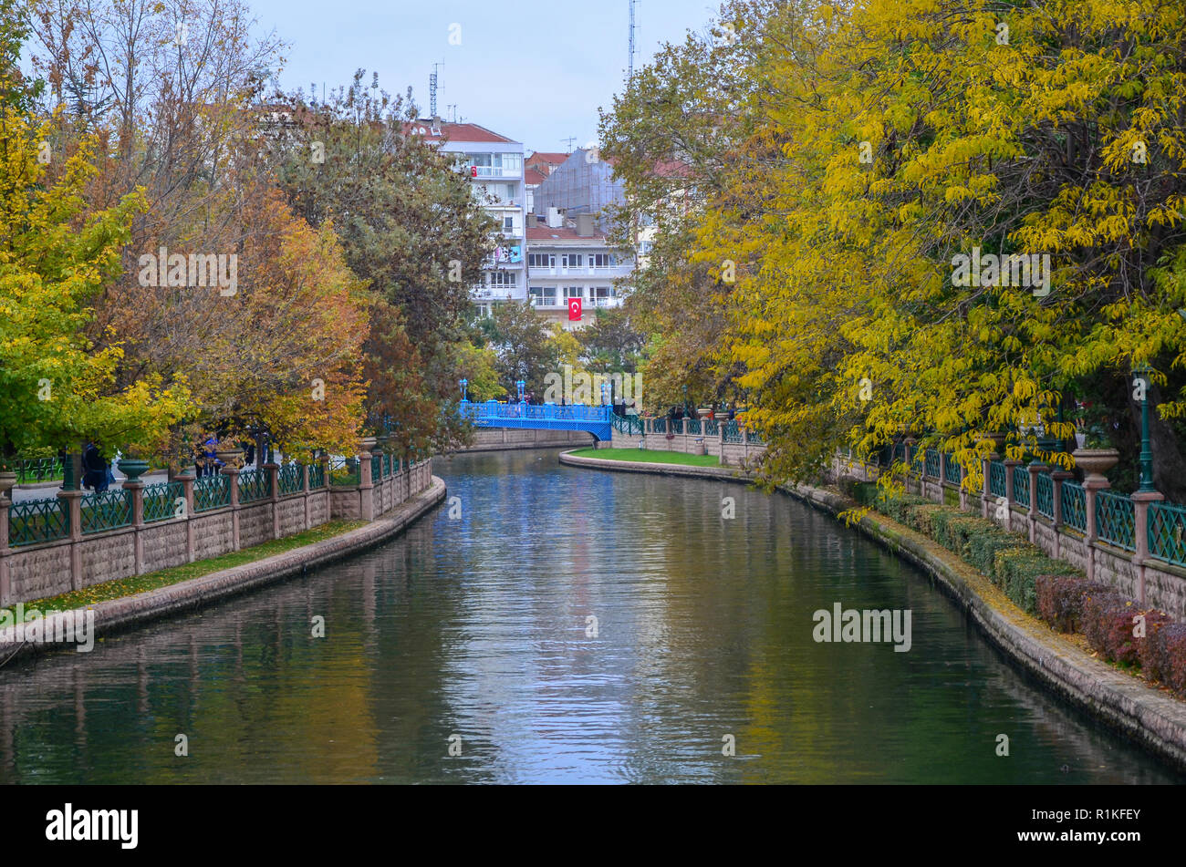 View of Porsuk River in Eskisehir.Reflection of the autumn landscape. Stock Photo