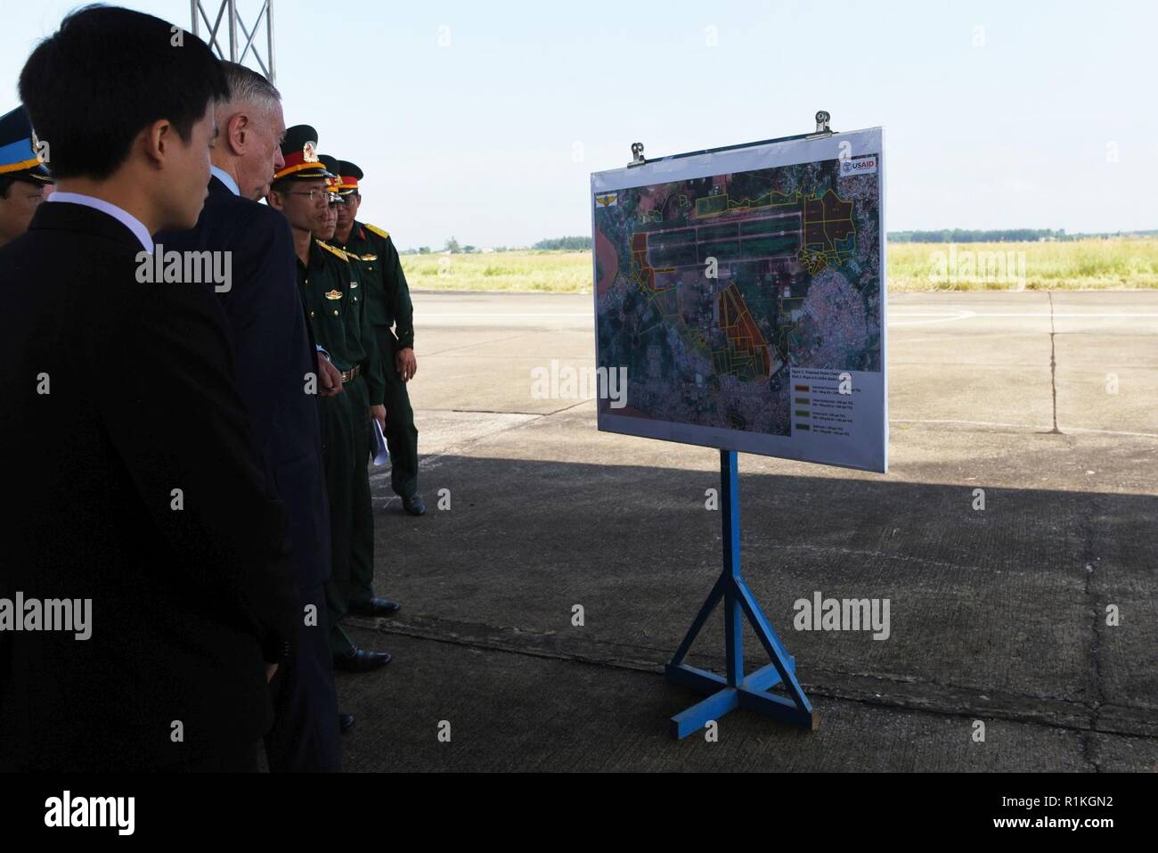 U.S. Secretary of Defense James N. Mattis meets with Vietnamese officials adjacent to a dioxin-contaminated site at Bien Hoa Air Base outside Ho Chi Minh City, Vietnam, Oct. 17, 2018. Stock Photo