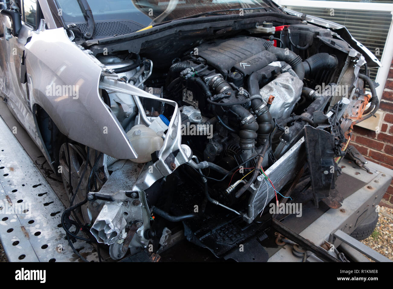 Engine and engine bay and written off front end in crash damaged