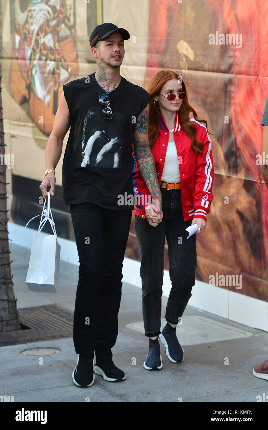 Riverdale star Madelaine Petsch and boyfriend Travis Mills out shopping in Beverly  Hills. The couple went to the Gucci store on the world famous Rodeo Drive  and later walked to Balenciaga store