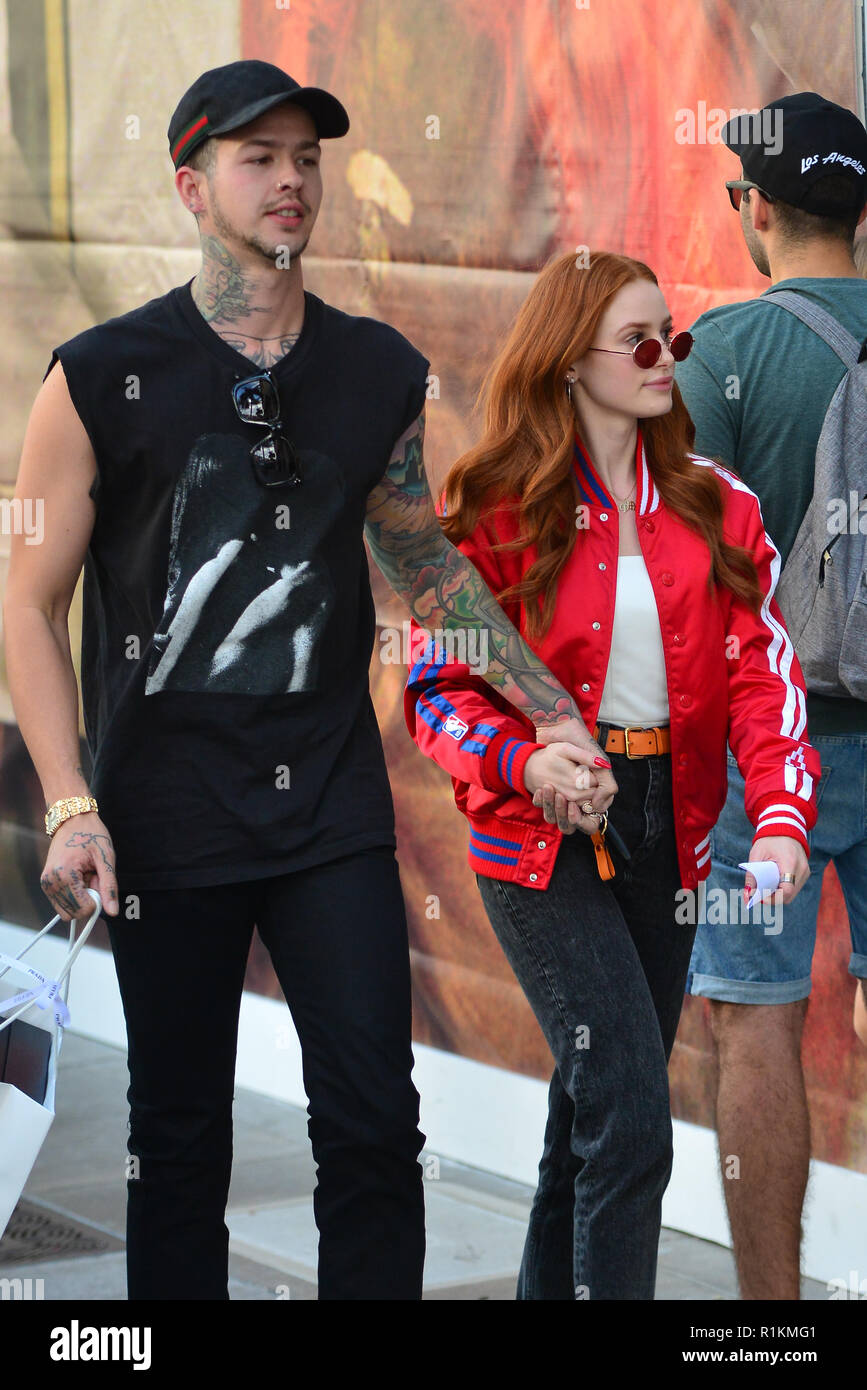 Riverdale star Madelaine Petsch and boyfriend Travis Mills out shopping in  Beverly Hills. The couple went to the Gucci store on the world famous Rodeo  Drive and later walked to Balenciaga store