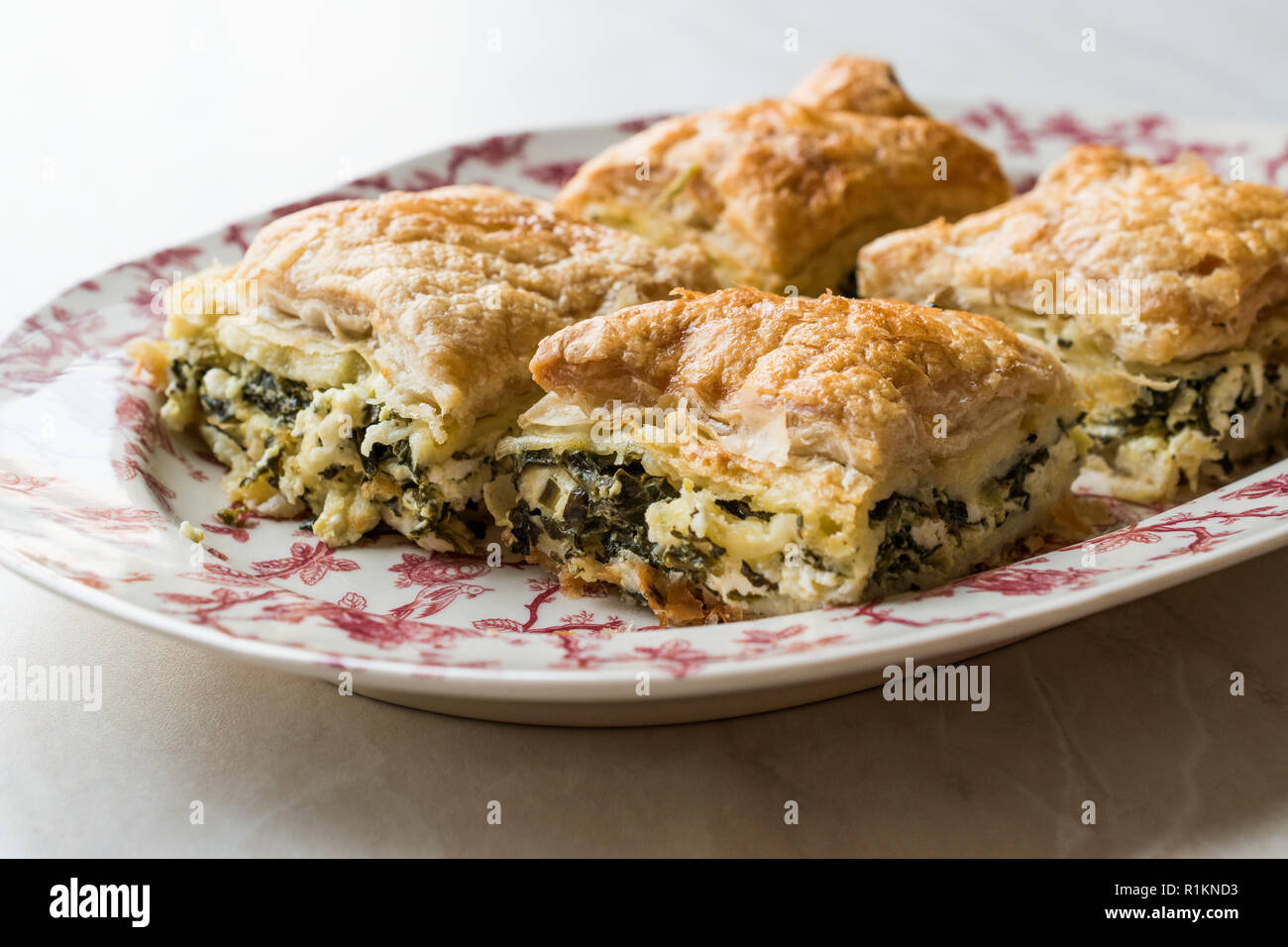 Turkish Borek Talas Boregi / Burek with Spinach and Cheese made with Mille Feuille. Traditional Food. Stock Photo