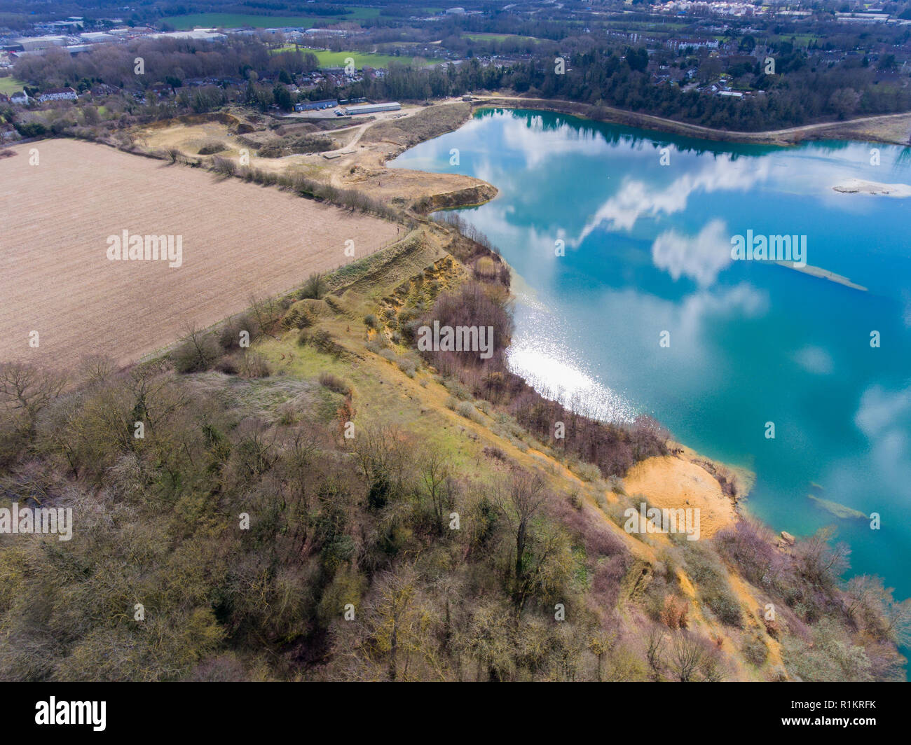 Blue water in a disused quarry Stock Photo Alamy