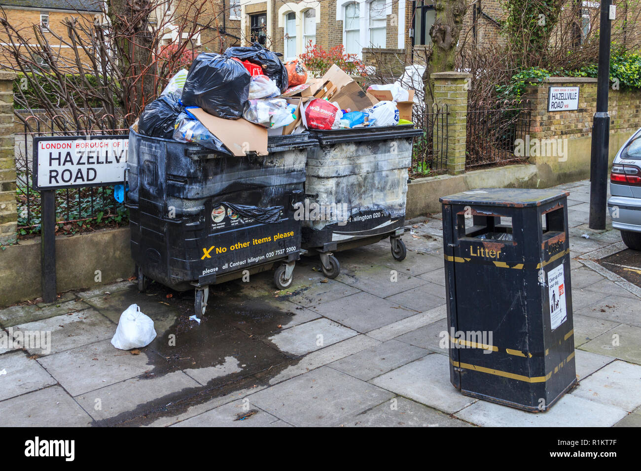 Overflowing recycling bins and dumped rubbish in Islington, London, UK Stock Photo Alamy