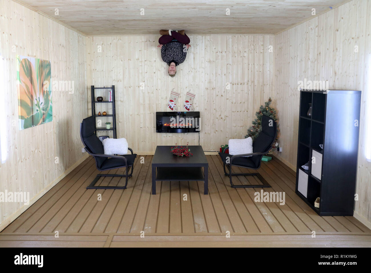 An Employee In One Of The Rooms In The Upside Down House