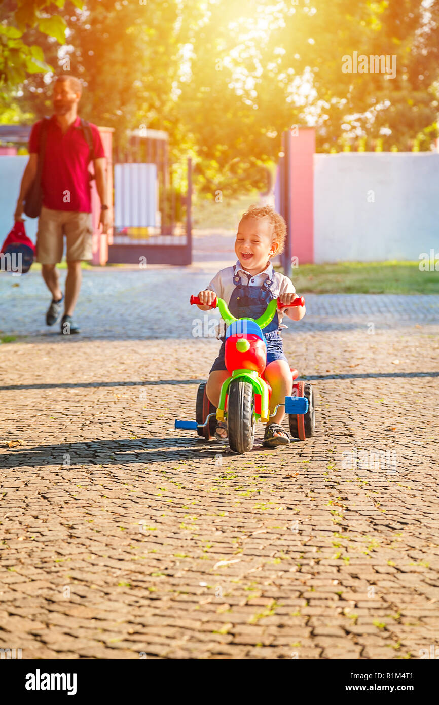 Baby Rider Outside Smiling children baby boy riding bicycle outdoor Stock Photo - Alamy