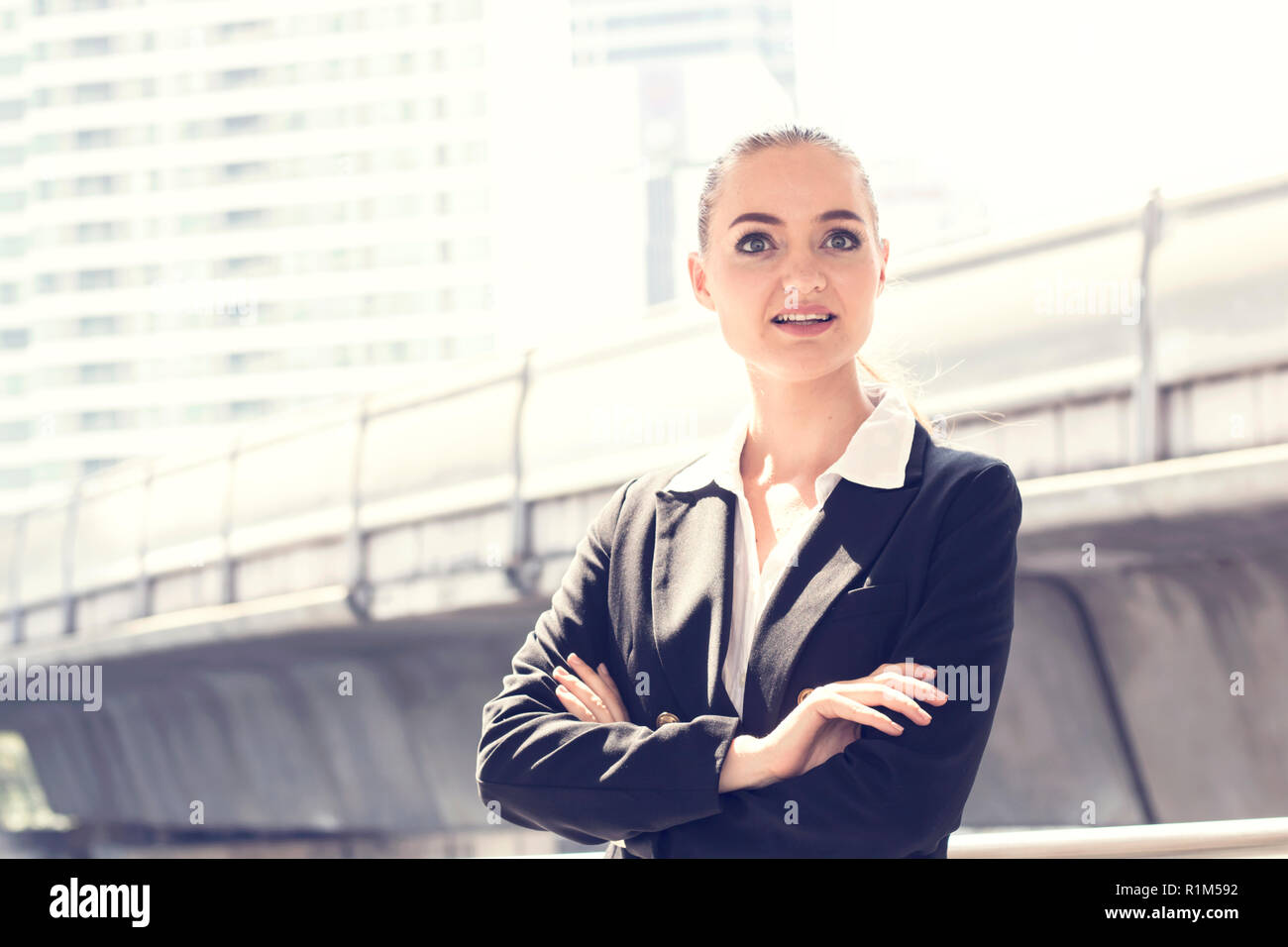 Confident woman standing hi-res stock photography and images - Alamy